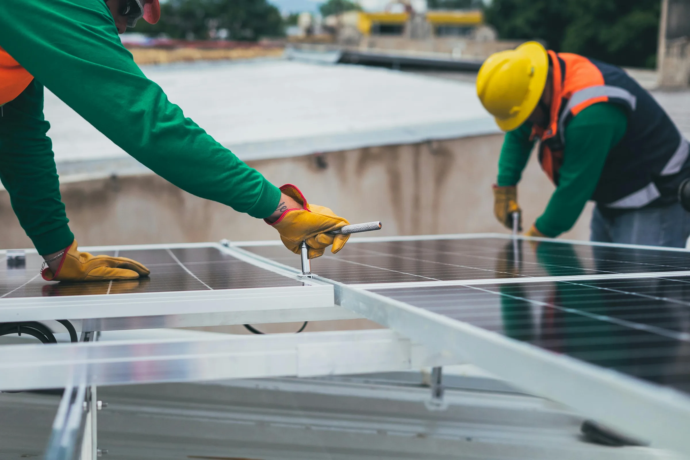 Installers mounting solar panels